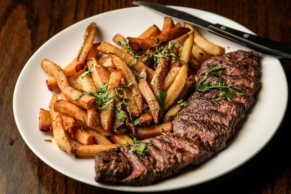 Sliced ribeye with hand-cut fries