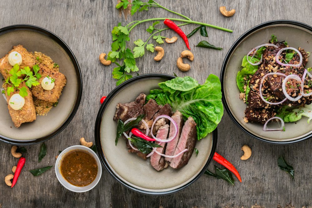 Seared beef over valley greens with herbs and chilies